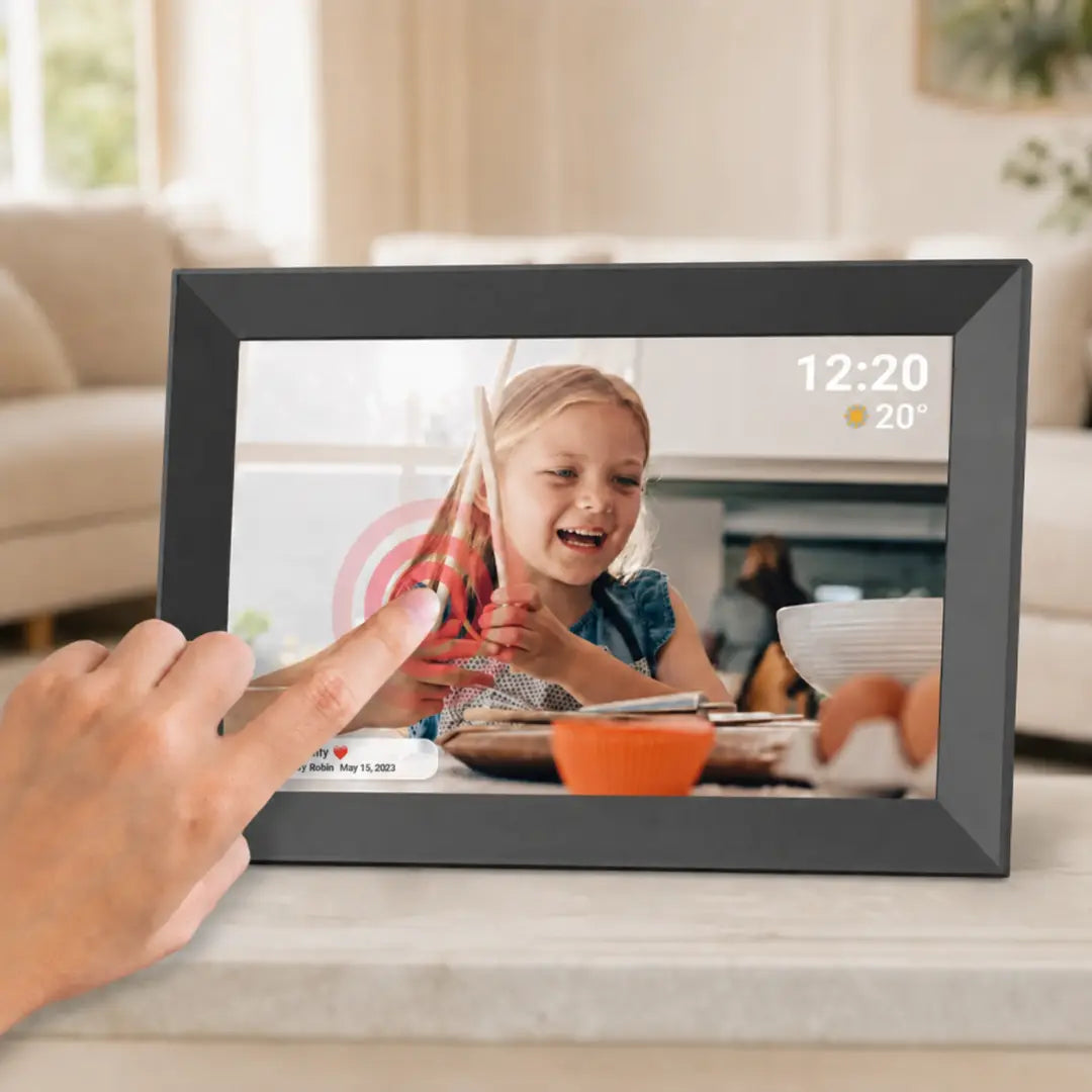 Hand using the touchscreen on a Lifeframe digital photo frame displaying a family photo, time and weather.