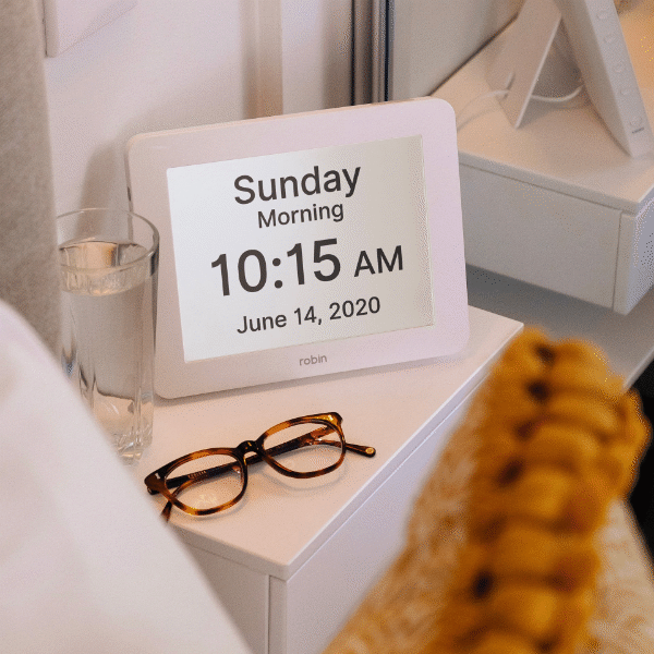 Dementia Clock beside bed.