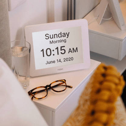 Dementia Clock beside bed.